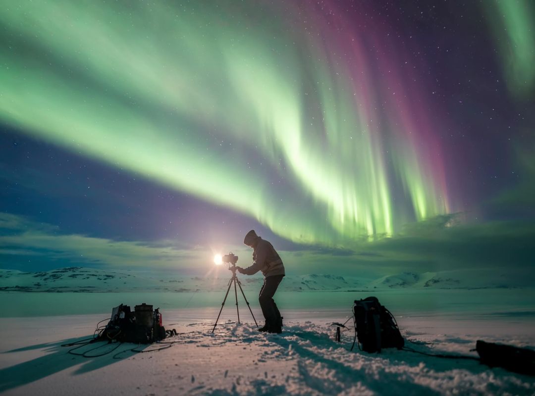 Photographer under the northern lights